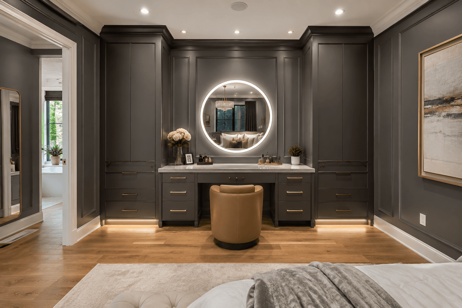 A Charcoal Built-In Vanity Wall with a Glowing Halo Mirror